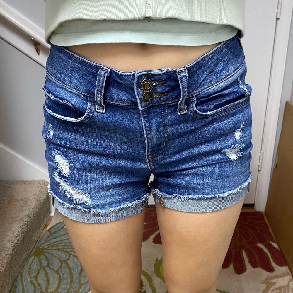 Cute ripped blue jean shorts